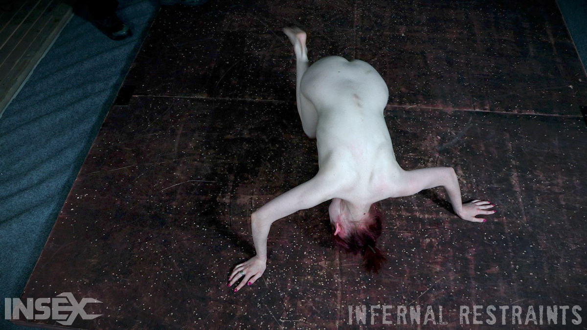 naked redhead penny lay is tortured while restrained in a dungeon