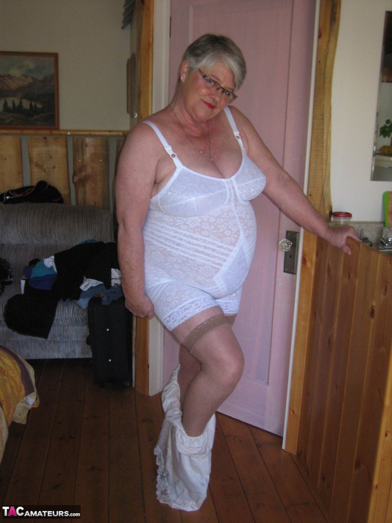 fat granny girdle goddess exposes her pussy in crotchless panties and a girdle