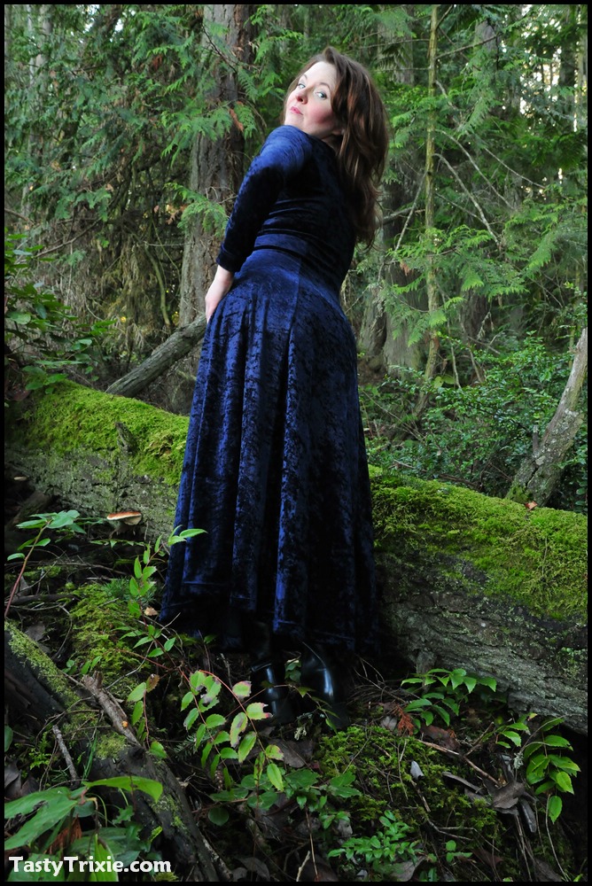 mature woman tasty trixie heads into the woods to flash in a long velvet dress