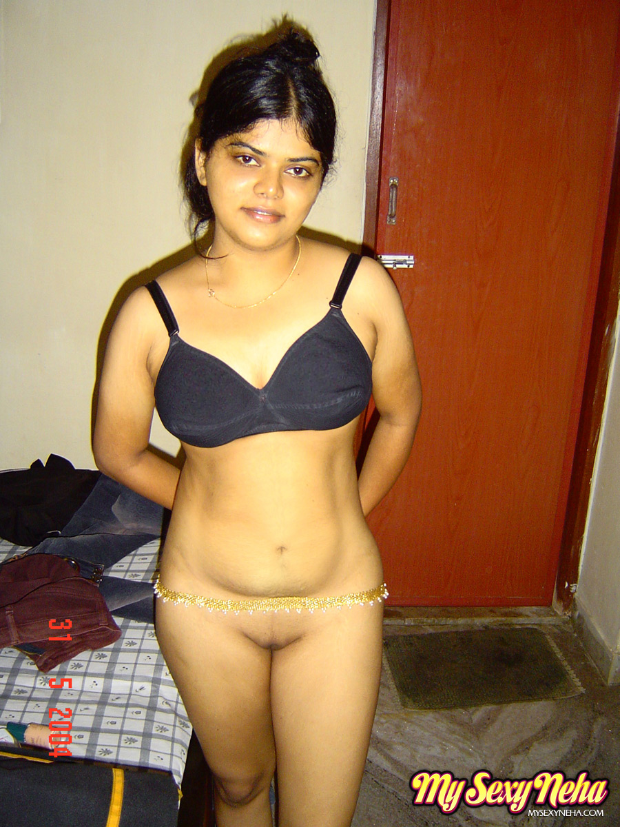 indian solo girl neha stands totally naked after disrobing in bedroom